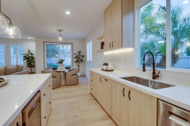 2850 Palmetto Point Ct, Chula Vista, CA 91915 - kitchen featuring dishwasher, light wood finished floors, beverage cooler, light countertops, and open floor plan