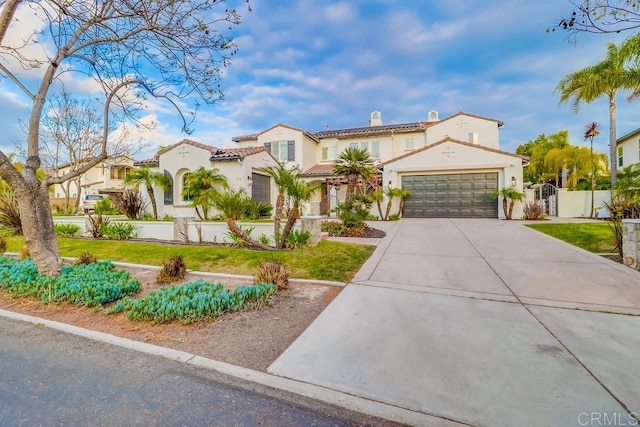 2850 Palmetto Point Ct, Chula Vista, CA 91915 - mediterranean / spanish-style home with stucco siding, concrete driveway, a gate, a chimney, and an attached garage