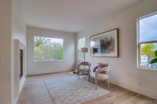 2850 Palmetto Point Ct, Chula Vista, CA 91915 - sitting room with healthy amount of natural light and light wood finished floors