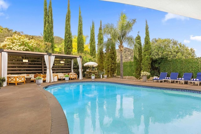 22053 Highland St, Wildomar, CA 92595 - view of pool with an outdoor living space