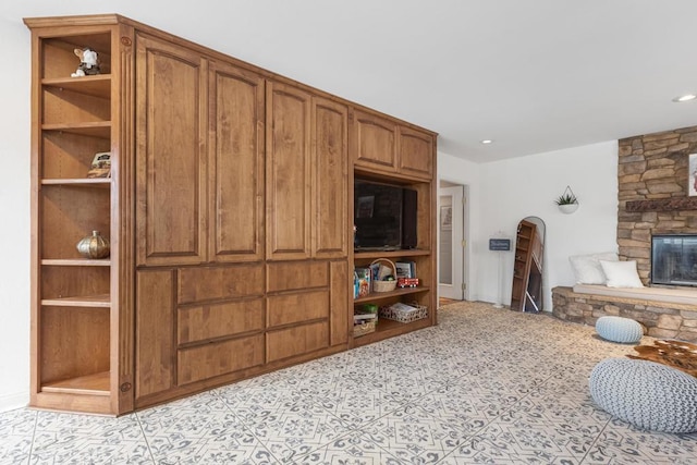 22053 Highland St, Wildomar, CA 92595 - living area featuring a stone fireplace, arched walkways, and recessed lighting