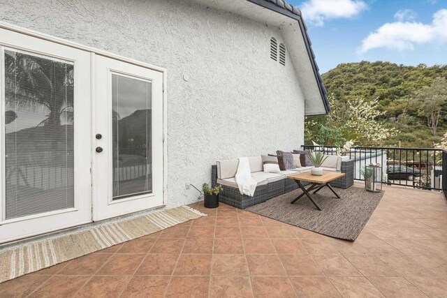22053 Highland St, Wildomar, CA 92595 - view of patio with a balcony and french doors