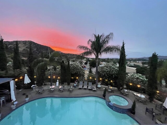 22053 Highland St, Wildomar, CA 92595 - view of pool featuring a patio area, a pool with connected hot tub, and a mountain view