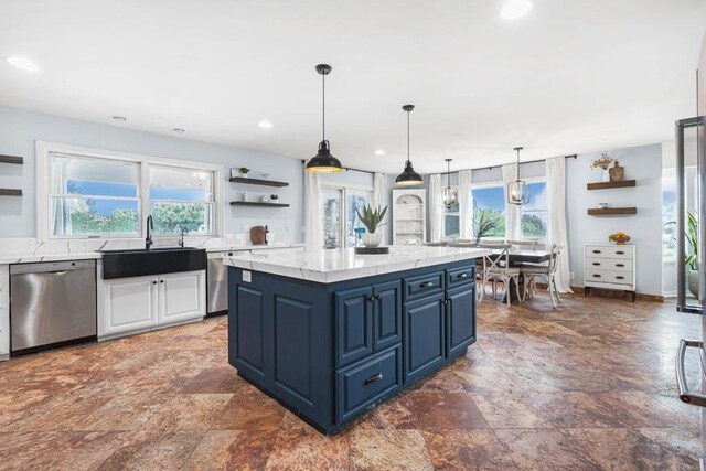 22053 Highland St, Wildomar, CA 92595 - kitchen with open shelves, stainless steel dishwasher, a sink, blue cabinets, and recessed lighting