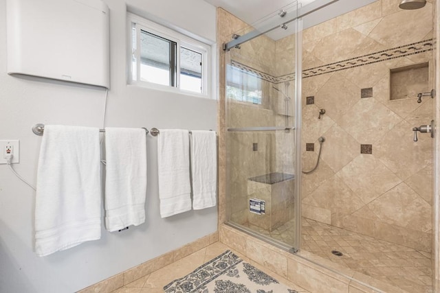 22053 Highland St, Wildomar, CA 92595 - bathroom with a shower stall, tile patterned floors, and baseboards