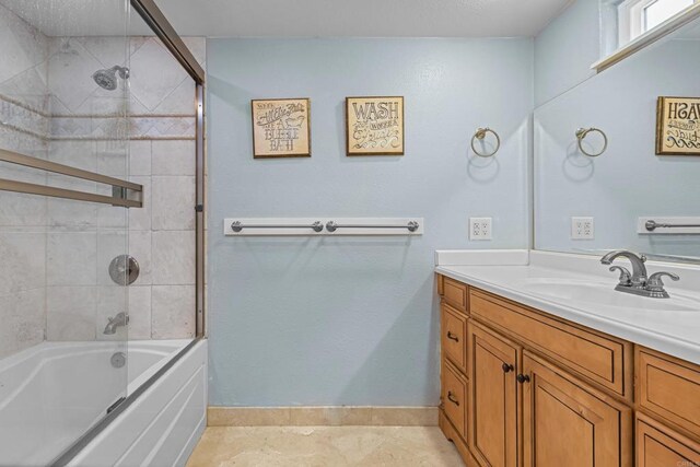 22053 Highland St, Wildomar, CA 92595 - bathroom featuring vanity,  shower combination, and baseboards