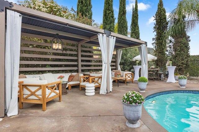 22053 Highland St, Wildomar, CA 92595 - view of patio featuring an outdoor hangout area, an outdoor pool, and a gazebo