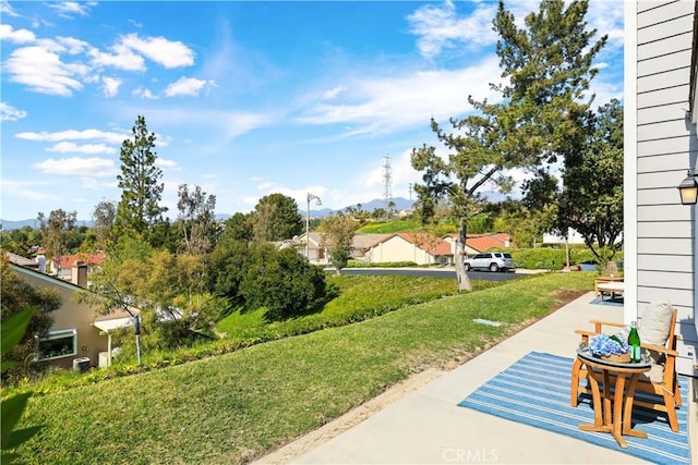 exterior space with a mountain view and a residential view