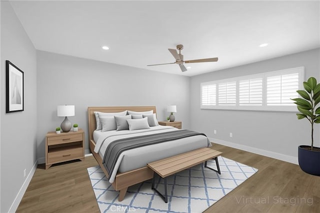 bedroom featuring baseboards, wood finished floors, recessed lighting, and ceiling fan