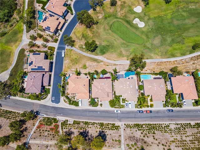 aerial view with a residential view and golf course view
