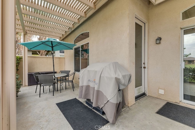 82689 Odlum Dr, Indio, CA 92201 - view of patio / terrace featuring a pergola, outdoor dining area, and visible vents
