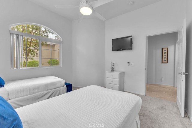 82689 Odlum Dr, Indio, CA 92201 - tiled bedroom with carpet flooring, baseboards, and a ceiling fan