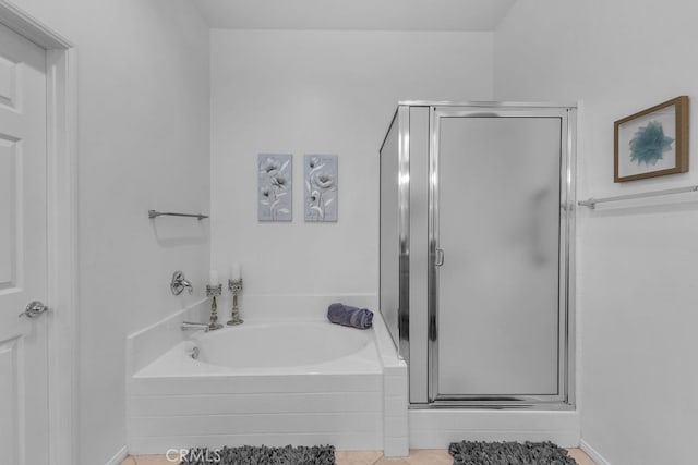 82689 Odlum Dr, Indio, CA 92201 - bathroom featuring a shower stall, tile patterned floors, and a garden tub