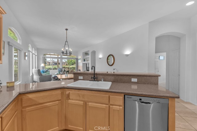 82689 Odlum Dr, Indio, CA 92201 - kitchen with dishwasher, a wealth of natural light, light tile patterned flooring, a sink, and open floor plan