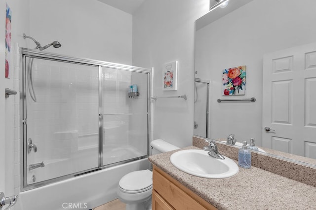 82689 Odlum Dr, Indio, CA 92201 - full bathroom with vanity, toilet, and enclosed tub / shower combo