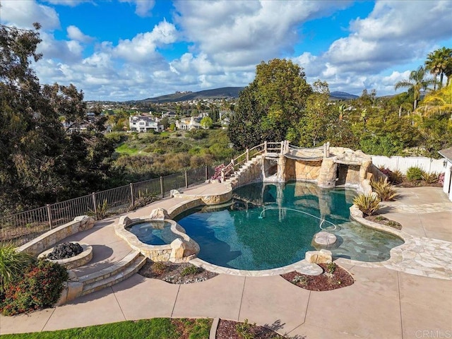 3506 Avenida Pantera, Carlsbad, CA 92009 - view of swimming pool with a fenced backyard, a patio area, a pool with connected hot tub, and a mountain view