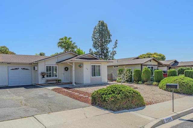 1398 Panorama Ridge Rd, Oceanside, CA 92056 - ranch-style home featuring a garage, stucco siding, and driveway
