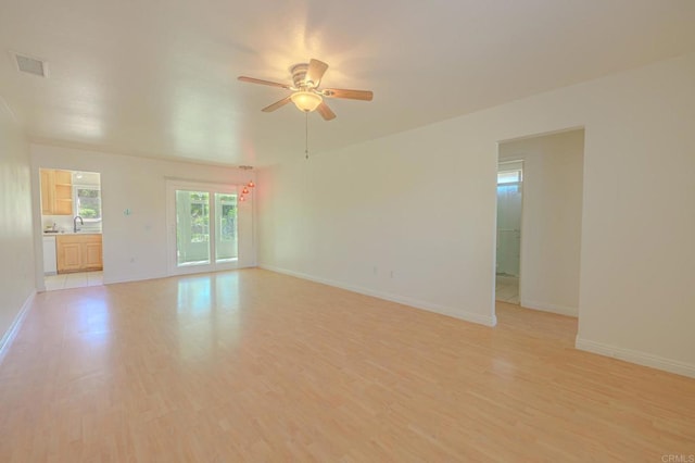 1398 Panorama Ridge Rd, Oceanside, CA 92056 - empty room featuring light wood finished floors and a ceiling fan