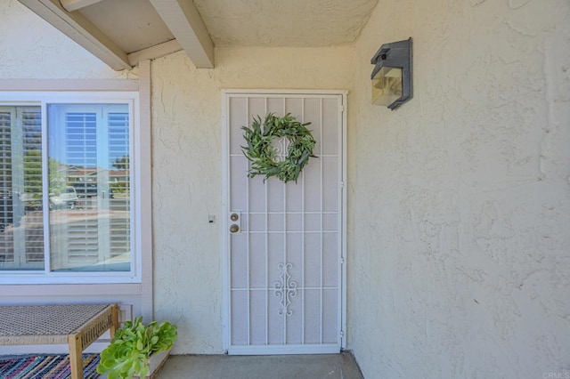 1398 Panorama Ridge Rd, Oceanside, CA 92056 - doorway to property with stucco siding