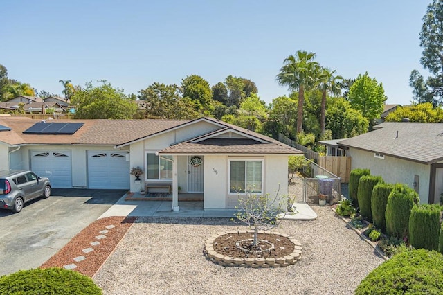 1398 Panorama Ridge Rd, Oceanside, CA 92056 - ranch-style home featuring a garage, driveway, stucco siding, and roof with shingles