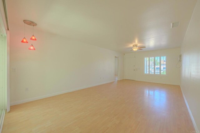 1398 Panorama Ridge Rd, Oceanside, CA 92056 - empty room featuring light wood finished floors and ceiling fan