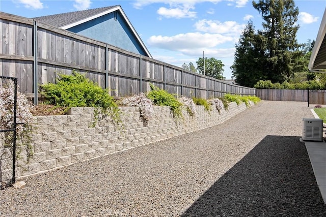 view of yard with a fenced backyard