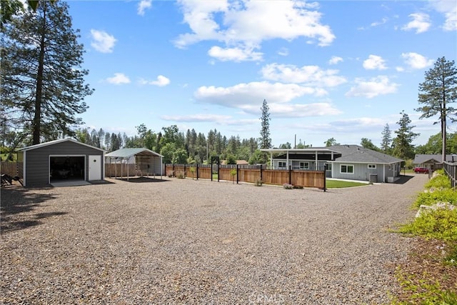 6294 W Wagstaff Rd, Paradise, CA 95969 - view of yard with an outbuilding, a detached garage, and gravel driveway