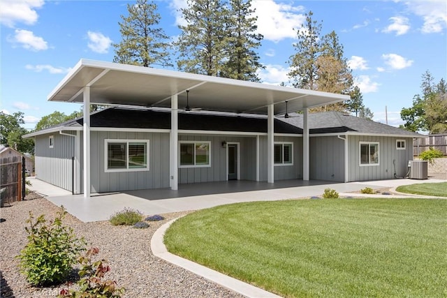 6294 W Wagstaff Rd, Paradise, CA 95969 - rear view of property with cooling unit, a patio area, a shingled roof, ceiling fan, and board and batten siding
