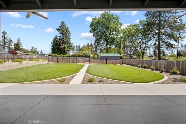 view of yard with a fenced backyard and a patio