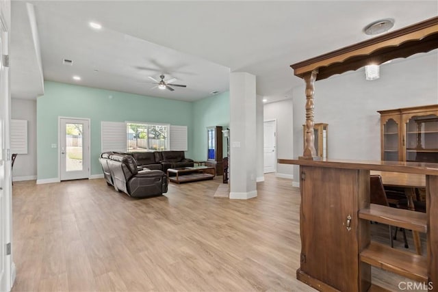 living area featuring recessed lighting, light wood-type flooring, baseboards, and ceiling fan