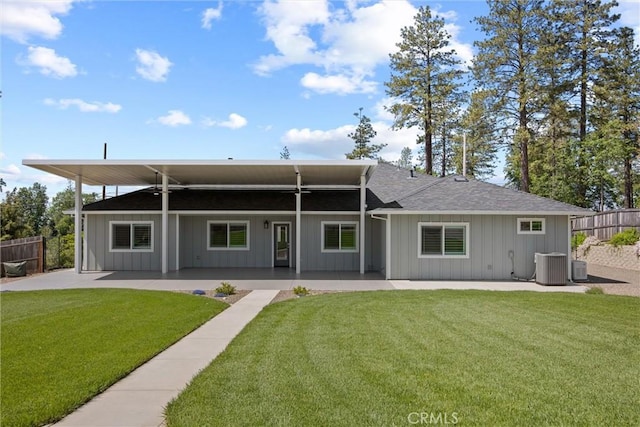 6294 W Wagstaff Rd, Paradise, CA 95969 - back of property with a patio, roof with shingles, and board and batten siding