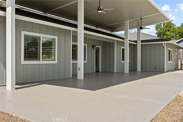 exterior space with a ceiling fan
