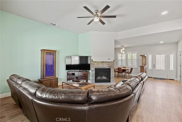 6294 W Wagstaff Rd, Paradise, CA 95969 - living room with a ceiling fan, light wood-style floors, and baseboards
