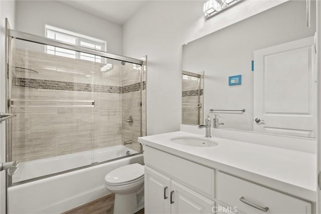 6294 W Wagstaff Rd, Paradise, CA 95969 - full bathroom featuring vanity, enclosed tub / shower combo, and wood finished floors