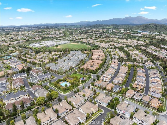 birds eye view of property with a residential view and a mountain view