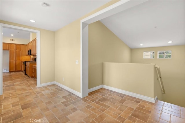 corridor featuring baseboards, visible vents, recessed lighting, an upstairs landing, and stone finish flooring