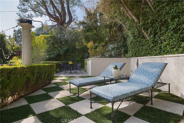 surrounding community with a patio