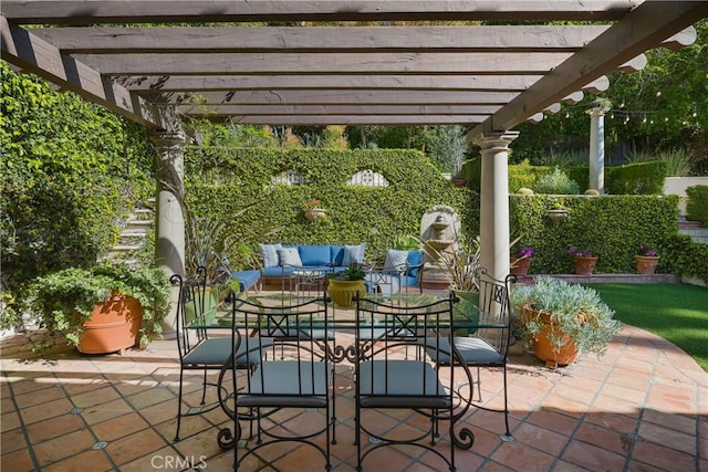 view of patio / terrace featuring a pergola and an outdoor living space