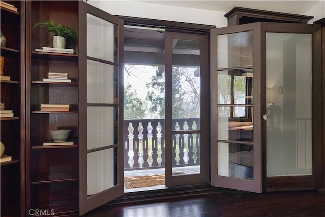 doorway with wood finished floors