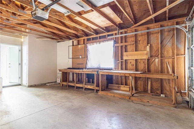 14292 Pinewood Dr, Hesperia, CA 92344 - interior space featuring a workshop area and a garage