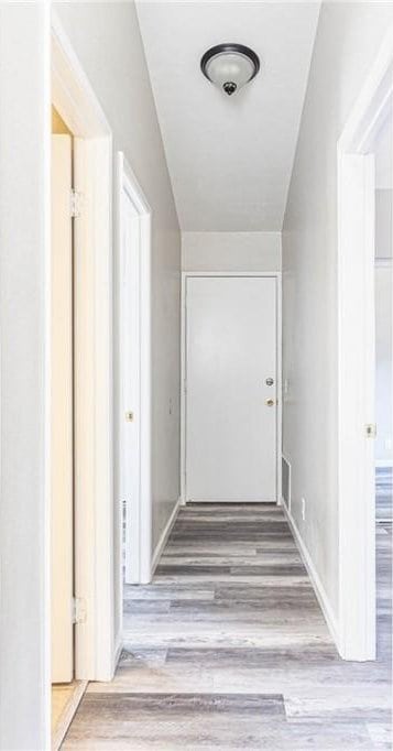 14292 Pinewood Dr, Hesperia, CA 92344 - corridor featuring visible vents and wood finished floors