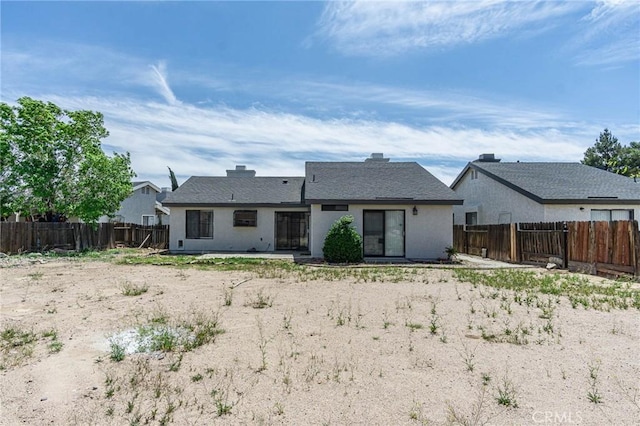 14292 Pinewood Dr, Hesperia, CA 92344 - back of house featuring a patio area, a fenced backyard, and stucco siding