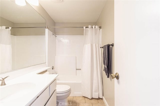 14292 Pinewood Dr, Hesperia, CA 92344 - full bathroom featuring tile patterned floors, toilet, baseboards, shower / bath combo with shower curtain, and vanity