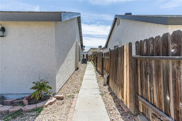 14292 Pinewood Dr, Hesperia, CA 92344 - view of property exterior with fence and stucco siding