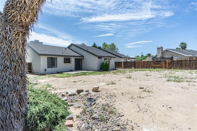 14292 Pinewood Dr, Hesperia, CA 92344 - rear view of property with a patio area, a fenced backyard, and stucco siding