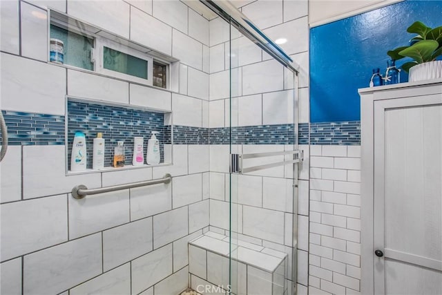 full bath with a shower stall