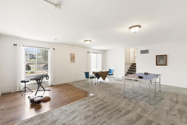 2409 Dehesa Rd, El Cajon, CA 92019 - game room featuring baseboards, visible vents, wood finished floors, and a healthy amount of sunlight
