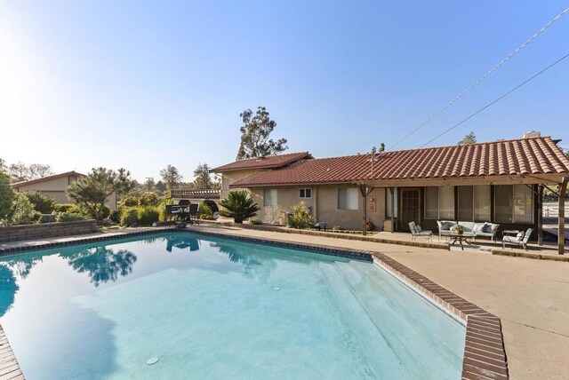 2409 Dehesa Rd, El Cajon, CA 92019 - outdoor pool featuring a patio and an outdoor hangout area