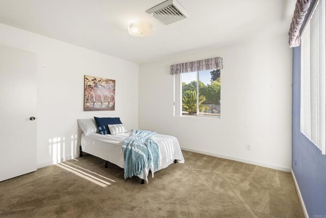 2409 Dehesa Rd, El Cajon, CA 92019 - carpeted bedroom with visible vents and baseboards