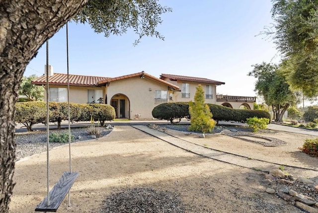 2409 Dehesa Rd, El Cajon, CA 92019 - mediterranean / spanish-style house with stucco siding and a tiled roof